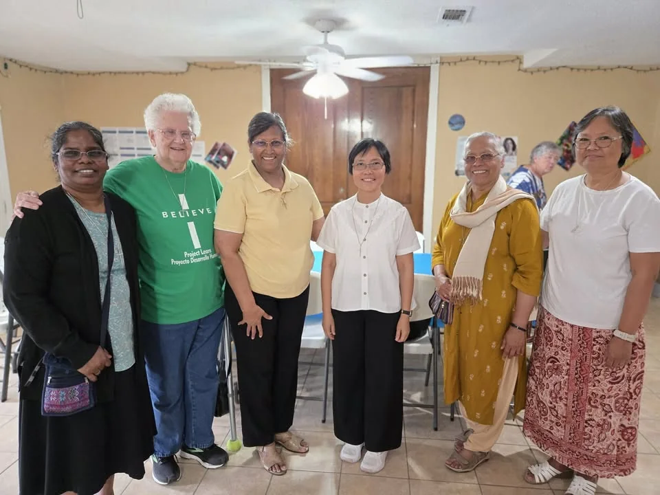 Sisters gathered together in community